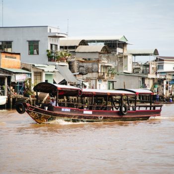 Classic mekong river boat sailing