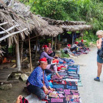 Local minority market where Red Dao tribe women sell their handicraft